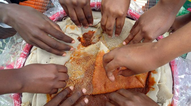 No forks and knives, you will have to just use your hands to roll the injera. Photo: Mesay Moges Menebo